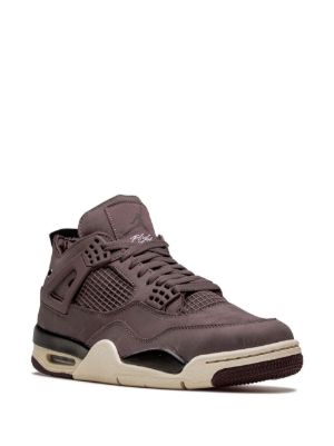 A single Air Jordan 4 sneaker in a dark plum purple colorway, featuring a dark purple leather and mesh upper, dark purple laces, a dark purple Air-Sock in the heel, and a cream midsole with a dark purple outsole.
