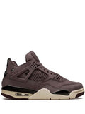 Brown sneaker with beige sole on a white background