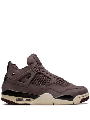 Brown sneaker with beige sole on a white background